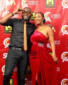 Event MC's Patrick Igunza and Resian Lebai pose for a photo